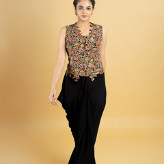 Designer indo western attire, cowl skirt with a corset top, top highlighted with hand embroidery