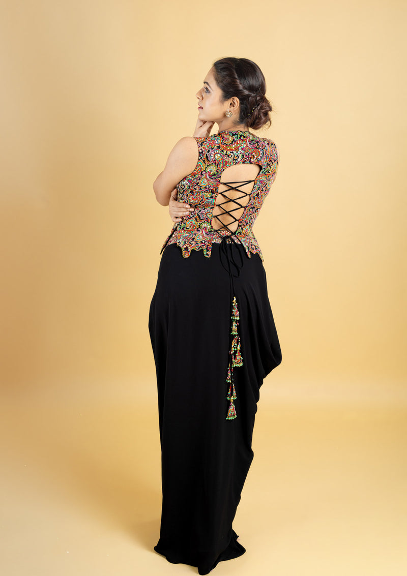 Designer indo western attire, cowl skirt with a corset top, top highlighted with hand embroidery