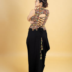 Designer indo western attire, cowl skirt with a corset top, top highlighted with hand embroidery