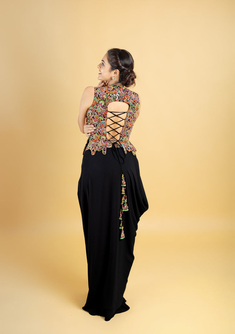 Designer indo western attire, cowl skirt with a corset top, top highlighted with hand embroidery