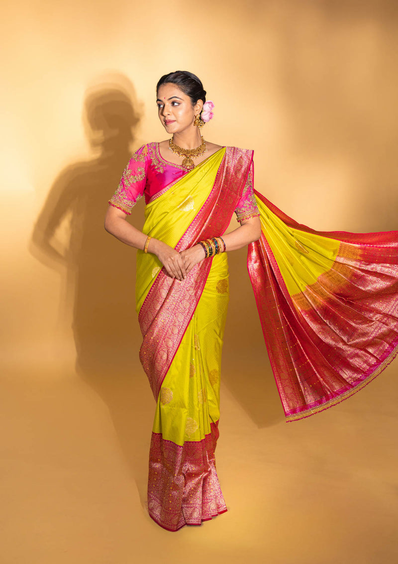 Designer pure banarasi brocade silk saree, with multicolored meena on saree border and on pallu. Saree is clubbed with designer hand embroidered blouse