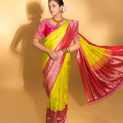 Designer pure banarasi brocade silk saree, with multicolored meena on saree border and on pallu. Saree is clubbed with designer hand embroidered blouse