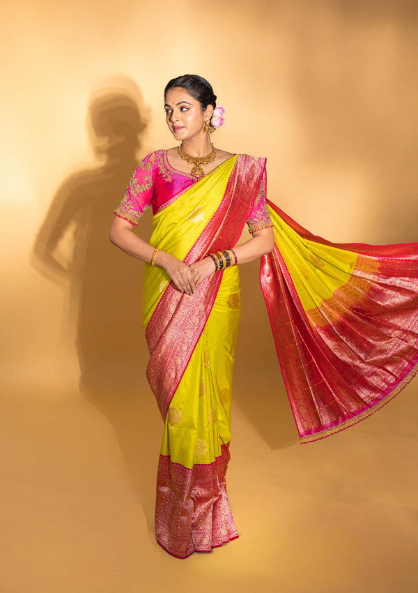 Designer pure banarasi brocade silk saree, with multicolored meena on saree border and on pallu. Saree is clubbed with designer hand embroidered blouse