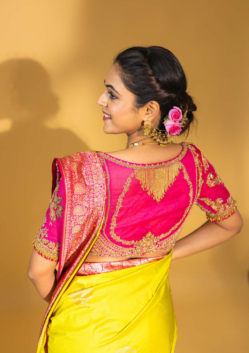 Designer pure banarasi brocade silk saree, with multicolored meena on saree border and on pallu. Saree is clubbed with designer hand embroidered blouse
