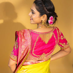 Designer pure banarasi brocade silk saree, with multicolored meena on saree border and on pallu. Saree is clubbed with designer hand embroidered blouse