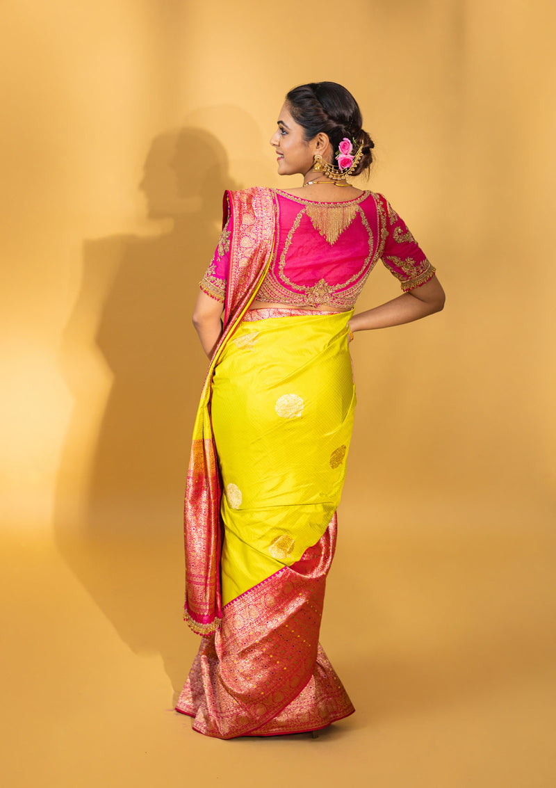 Designer pure banarasi brocade silk saree, with multicolored meena on saree border and on pallu. Saree is clubbed with designer hand embroidered blouse