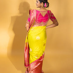 Designer pure banarasi brocade silk saree, with multicolored meena on saree border and on pallu. Saree is clubbed with designer hand embroidered blouse