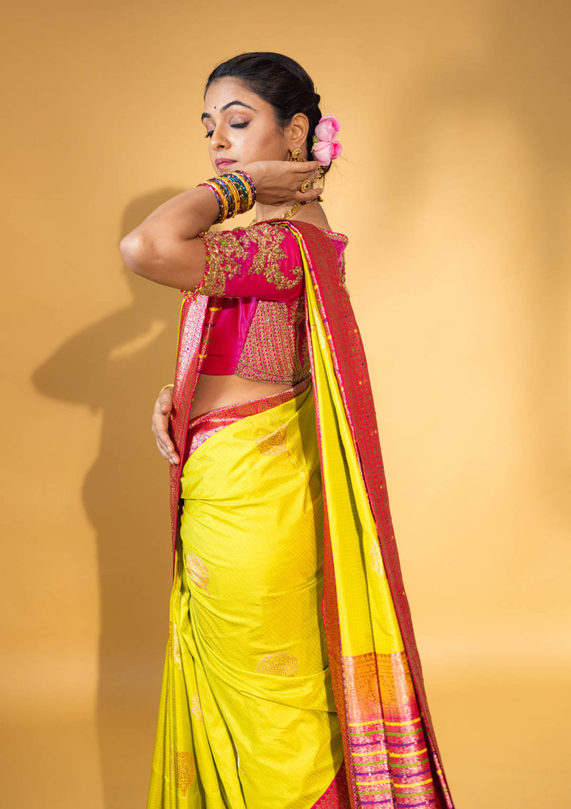Designer pure banarasi brocade silk saree, with multicolored meena on saree border and on pallu. Saree is clubbed with designer hand embroidered blouse
