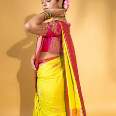 Designer pure banarasi brocade silk saree, with multicolored meena on saree border and on pallu. Saree is clubbed with designer hand embroidered blouse